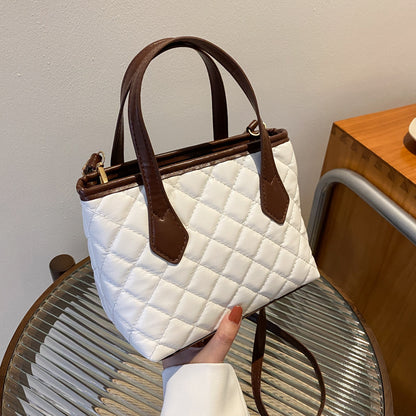 Texture French Mini Portable Bucket Bag Women's New Spring Commuter Shoulder Bag Western Style Messenger Bag