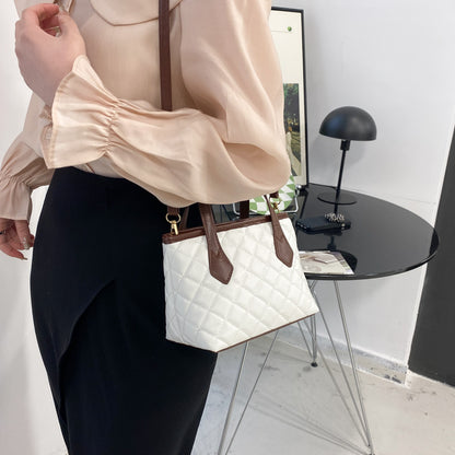 Texture French Mini Portable Bucket Bag Women's New Spring Commuter Shoulder Bag Western Style Messenger Bag