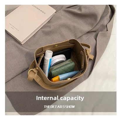 Handheld bucket bag, women's fashionable small handbag, outdoor commuting crossbody bag